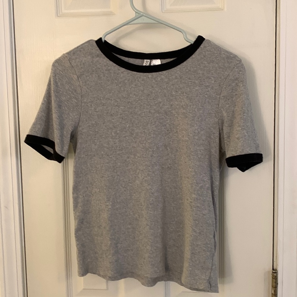 Grey tee with black collar and sleeve lining